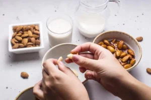 Healthy snacks for people with diabetes, including Greek yogurt with berries, nuts, and fresh vegetables, ideal for stabilizing blood sugar levels.