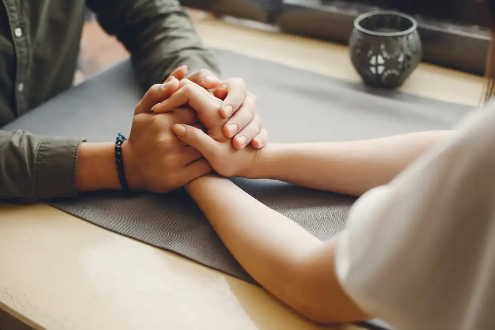 Couple sharing a warm hug showcasing the importance of physical touch in relationships