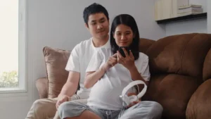 Couple supporting each other during pregnancy, illustrating how to overcome pregnancy challenges for couples