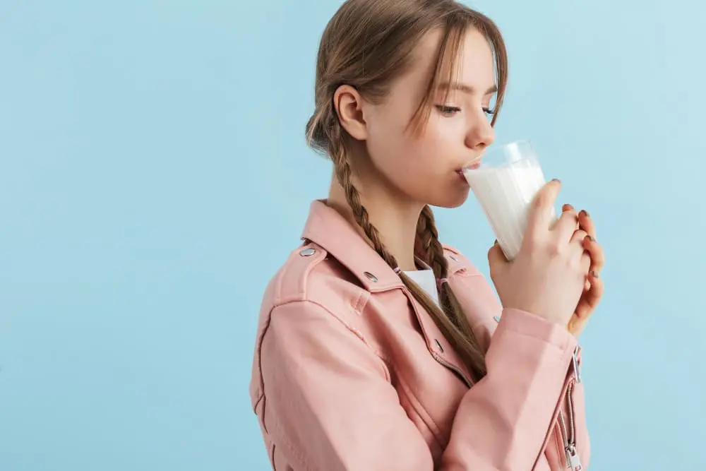 Glass of fish milk with fish roe, highlighting its rich omega-3 content and health benefits as a nutritious alternative to cow's milk.